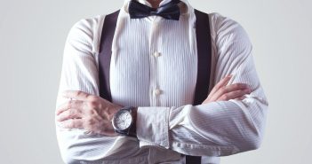 A shirt with braces and a bow tie