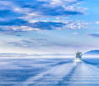 The white liner sailing on blue water